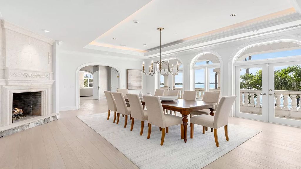Discover an unparalleled opportunity in South Florida with this magnificent estate boasting nearly 4 acres of prime coastline, featuring 350 feet of direct Intracoastal waterfrontage and an additional 350 feet of direct oceanfrontage.