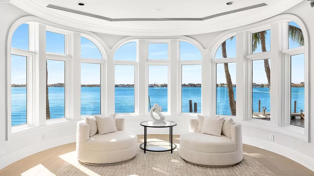 Discover an unparalleled opportunity in South Florida with this magnificent estate boasting nearly 4 acres of prime coastline, featuring 350 feet of direct Intracoastal waterfrontage and an additional 350 feet of direct oceanfrontage.