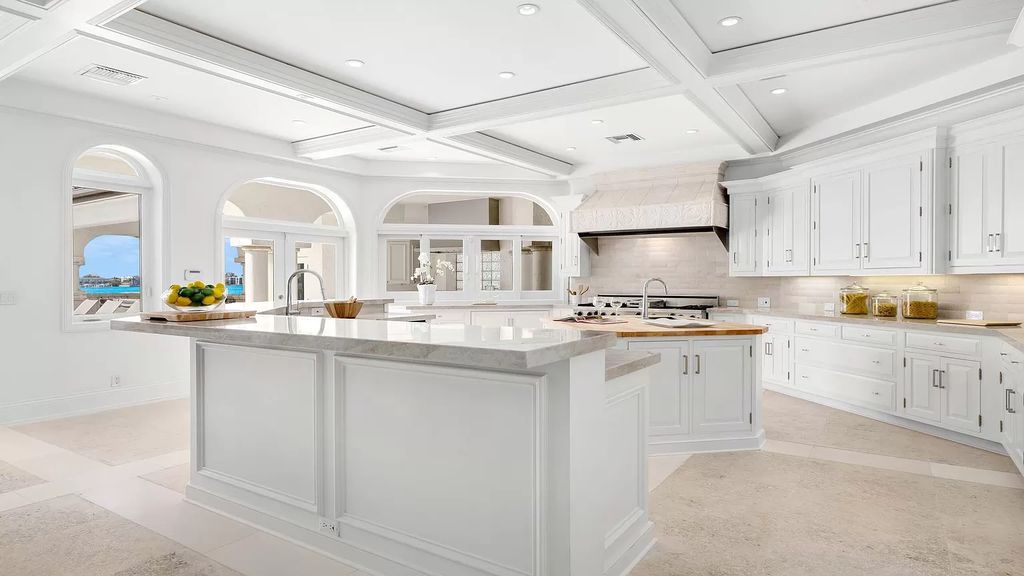 Discover an unparalleled opportunity in South Florida with this magnificent estate boasting nearly 4 acres of prime coastline, featuring 350 feet of direct Intracoastal waterfrontage and an additional 350 feet of direct oceanfrontage.
