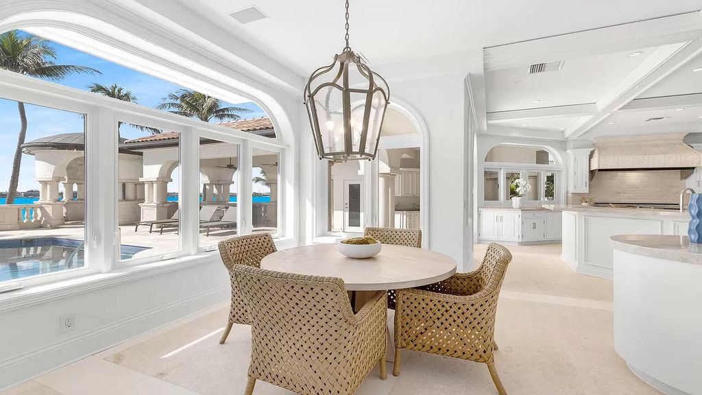 Discover an unparalleled opportunity in South Florida with this magnificent estate boasting nearly 4 acres of prime coastline, featuring 350 feet of direct Intracoastal waterfrontage and an additional 350 feet of direct oceanfrontage.
