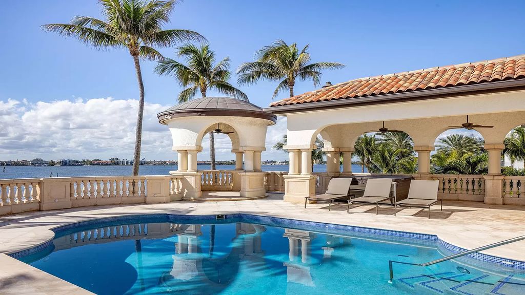 Discover an unparalleled opportunity in South Florida with this magnificent estate boasting nearly 4 acres of prime coastline, featuring 350 feet of direct Intracoastal waterfrontage and an additional 350 feet of direct oceanfrontage.