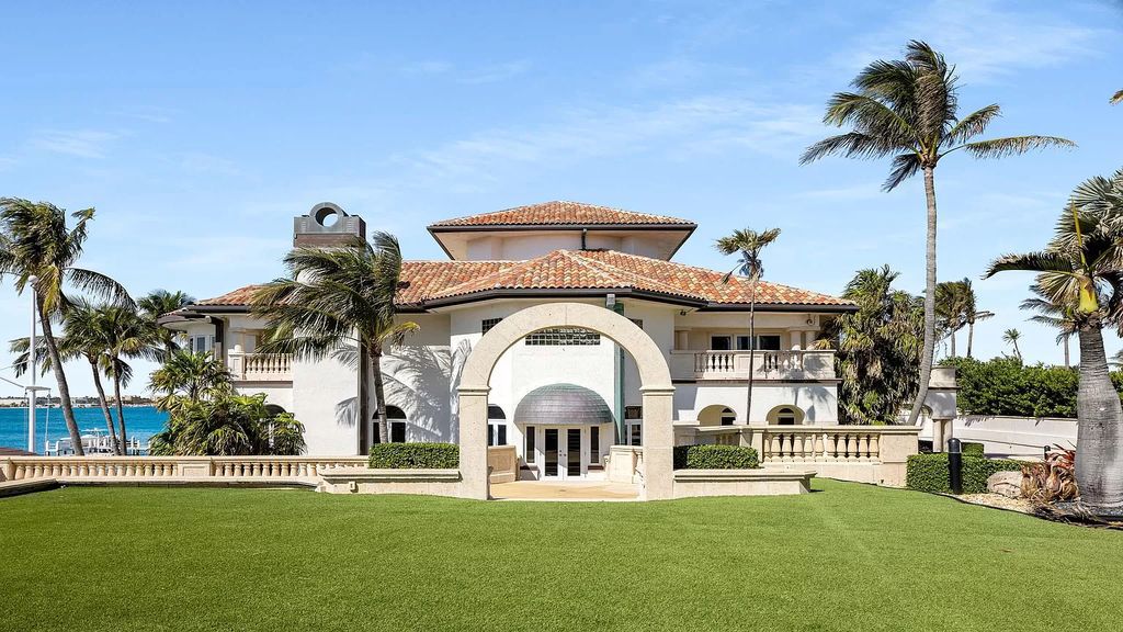 Discover an unparalleled opportunity in South Florida with this magnificent estate boasting nearly 4 acres of prime coastline, featuring 350 feet of direct Intracoastal waterfrontage and an additional 350 feet of direct oceanfrontage.