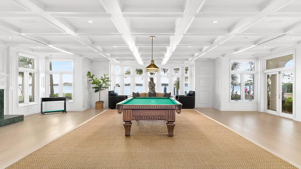 Discover an unparalleled opportunity in South Florida with this magnificent estate boasting nearly 4 acres of prime coastline, featuring 350 feet of direct Intracoastal waterfrontage and an additional 350 feet of direct oceanfrontage.