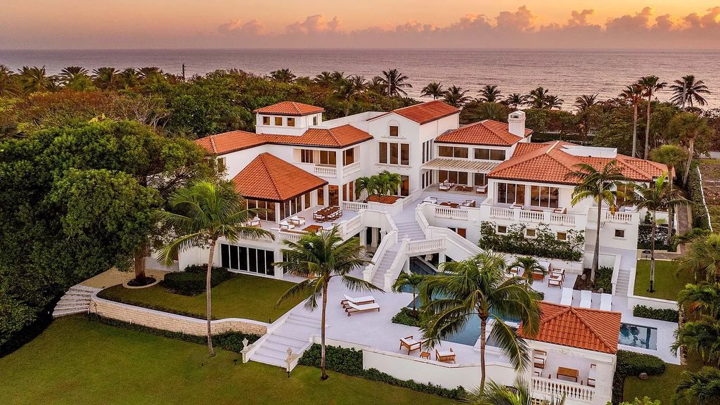 Presenting an extraordinary opportunity along 1840 S Ocean Blvd in Manalapan, Florida, this recently updated Ocean-to-Intracoastal compound offers luxurious waterfront living on nearly two acres of prime real estate.