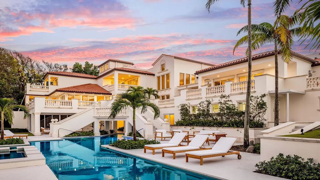 Presenting an extraordinary opportunity along 1840 S Ocean Blvd in Manalapan, Florida, this recently updated Ocean-to-Intracoastal compound offers luxurious waterfront living on nearly two acres of prime real estate.
