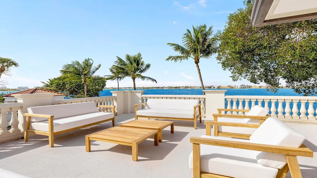 Presenting an extraordinary opportunity along 1840 S Ocean Blvd in Manalapan, Florida, this recently updated Ocean-to-Intracoastal compound offers luxurious waterfront living on nearly two acres of prime real estate.