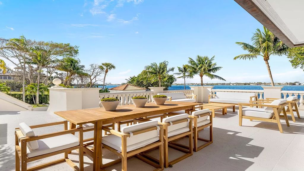 Presenting an extraordinary opportunity along 1840 S Ocean Blvd in Manalapan, Florida, this recently updated Ocean-to-Intracoastal compound offers luxurious waterfront living on nearly two acres of prime real estate.