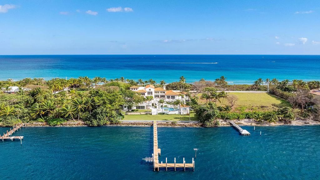 Presenting an extraordinary opportunity along 1840 S Ocean Blvd in Manalapan, Florida, this recently updated Ocean-to-Intracoastal compound offers luxurious waterfront living on nearly two acres of prime real estate.