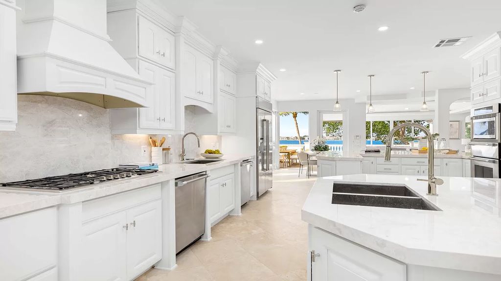 Presenting an extraordinary opportunity along 1840 S Ocean Blvd in Manalapan, Florida, this recently updated Ocean-to-Intracoastal compound offers luxurious waterfront living on nearly two acres of prime real estate.