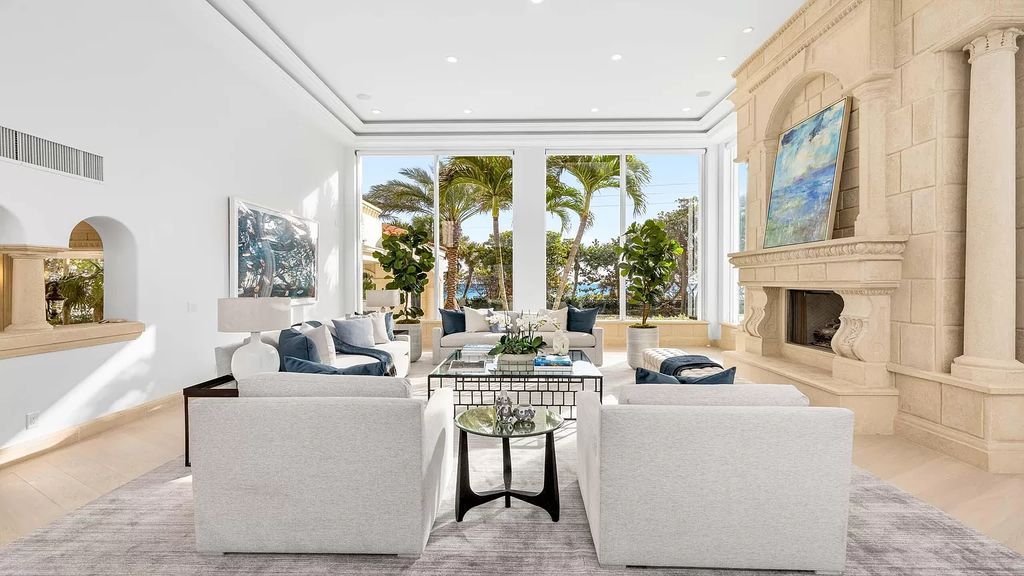 Presenting an extraordinary opportunity along 1840 S Ocean Blvd in Manalapan, Florida, this recently updated Ocean-to-Intracoastal compound offers luxurious waterfront living on nearly two acres of prime real estate.