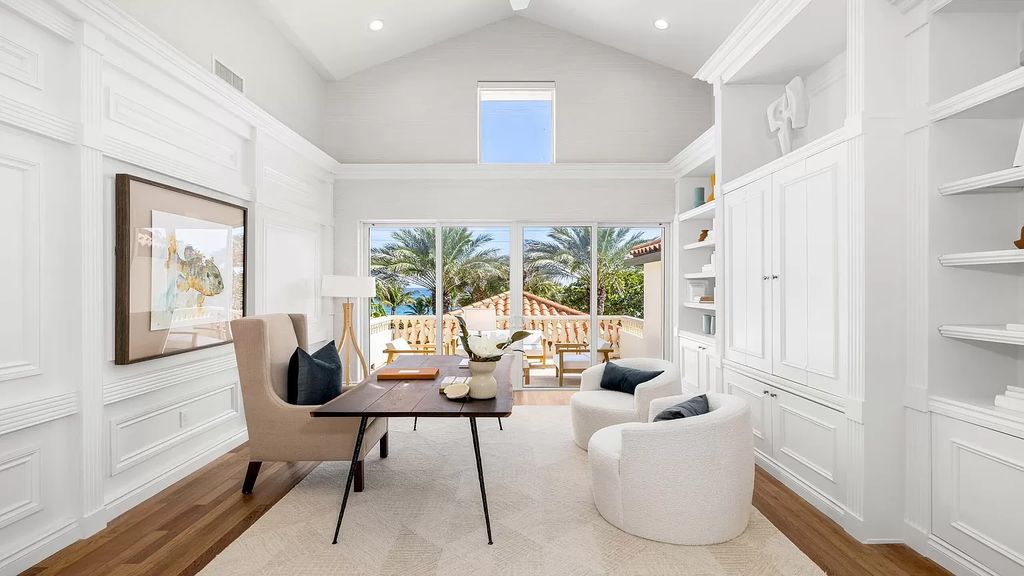 Presenting an extraordinary opportunity along 1840 S Ocean Blvd in Manalapan, Florida, this recently updated Ocean-to-Intracoastal compound offers luxurious waterfront living on nearly two acres of prime real estate.