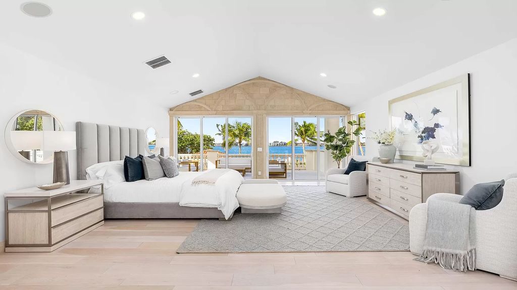Presenting an extraordinary opportunity along 1840 S Ocean Blvd in Manalapan, Florida, this recently updated Ocean-to-Intracoastal compound offers luxurious waterfront living on nearly two acres of prime real estate.
