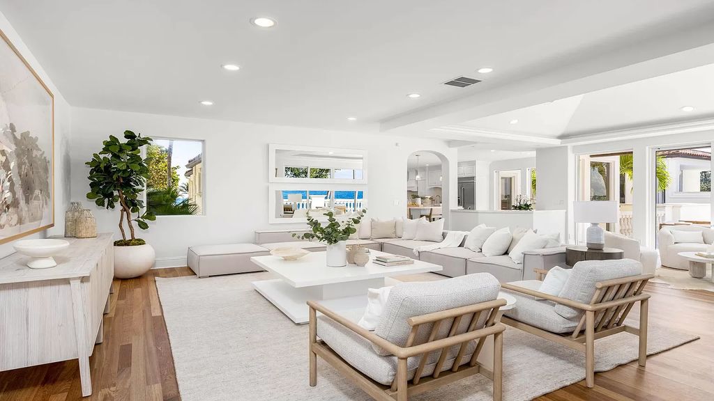 Presenting an extraordinary opportunity along 1840 S Ocean Blvd in Manalapan, Florida, this recently updated Ocean-to-Intracoastal compound offers luxurious waterfront living on nearly two acres of prime real estate.