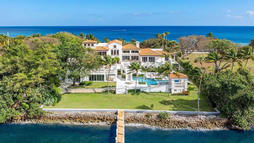 Presenting an extraordinary opportunity along 1840 S Ocean Blvd in Manalapan, Florida, this recently updated Ocean-to-Intracoastal compound offers luxurious waterfront living on nearly two acres of prime real estate.