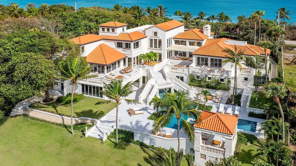 Presenting an extraordinary opportunity along 1840 S Ocean Blvd in Manalapan, Florida, this recently updated Ocean-to-Intracoastal compound offers luxurious waterfront living on nearly two acres of prime real estate.