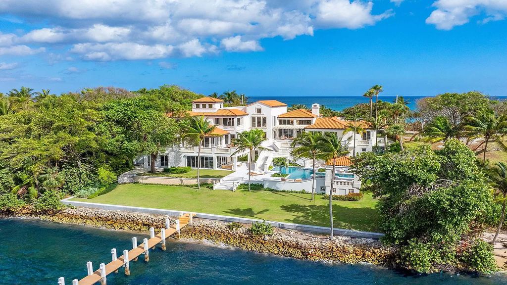Presenting an extraordinary opportunity along 1840 S Ocean Blvd in Manalapan, Florida, this recently updated Ocean-to-Intracoastal compound offers luxurious waterfront living on nearly two acres of prime real estate.