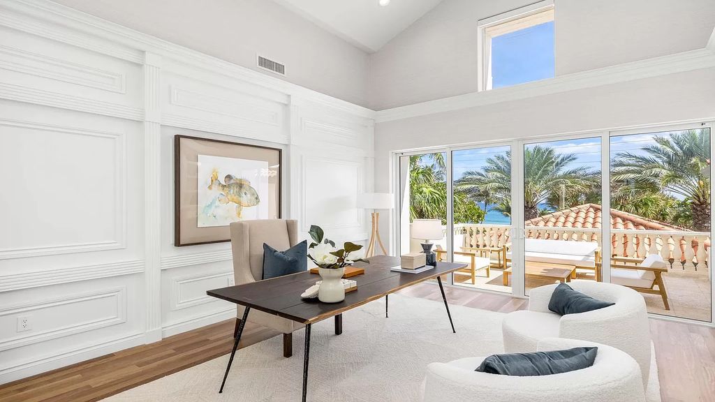 Presenting an extraordinary opportunity along 1840 S Ocean Blvd in Manalapan, Florida, this recently updated Ocean-to-Intracoastal compound offers luxurious waterfront living on nearly two acres of prime real estate.