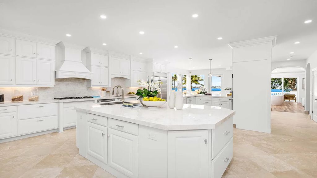 Presenting an extraordinary opportunity along 1840 S Ocean Blvd in Manalapan, Florida, this recently updated Ocean-to-Intracoastal compound offers luxurious waterfront living on nearly two acres of prime real estate.