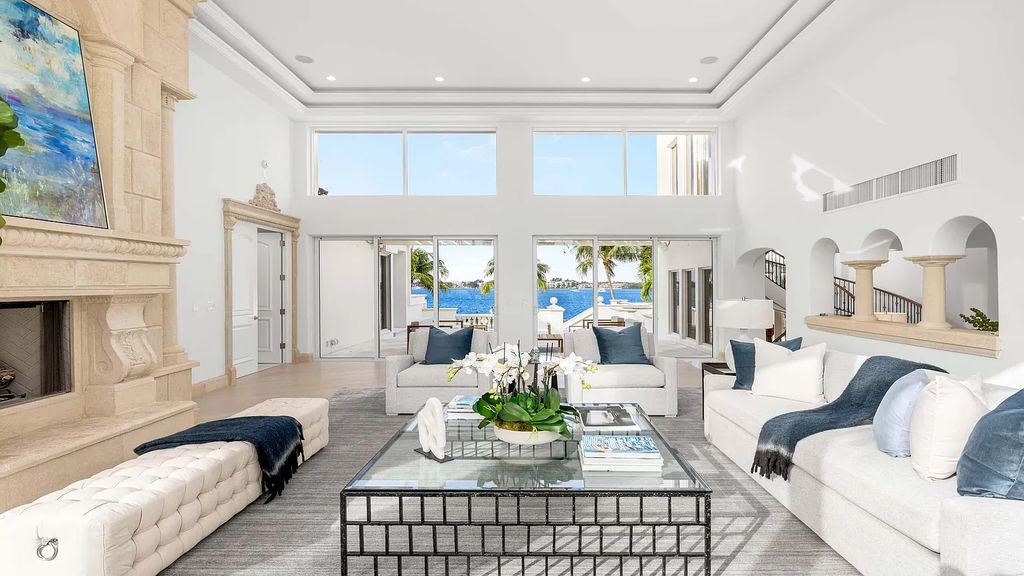 Presenting an extraordinary opportunity along 1840 S Ocean Blvd in Manalapan, Florida, this recently updated Ocean-to-Intracoastal compound offers luxurious waterfront living on nearly two acres of prime real estate.