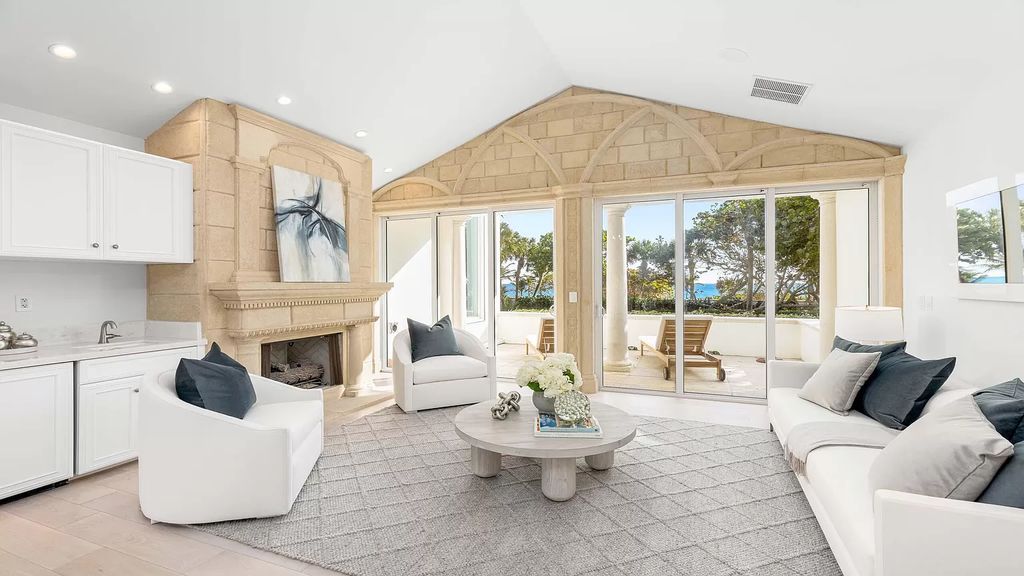 Presenting an extraordinary opportunity along 1840 S Ocean Blvd in Manalapan, Florida, this recently updated Ocean-to-Intracoastal compound offers luxurious waterfront living on nearly two acres of prime real estate.
