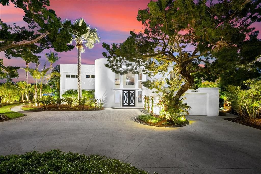Nestled along the serene shores of Cocoanut Bayou, this captivating 4-bedroom, 4-bathroom sanctuary offers an unparalleled lifestyle for sailboat enthusiasts, boasting two boat lifts and panoramic water views.