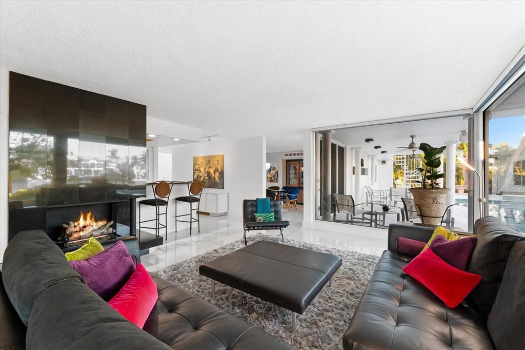 Nestled along the serene shores of Cocoanut Bayou, this captivating 4-bedroom, 4-bathroom sanctuary offers an unparalleled lifestyle for sailboat enthusiasts, boasting two boat lifts and panoramic water views.