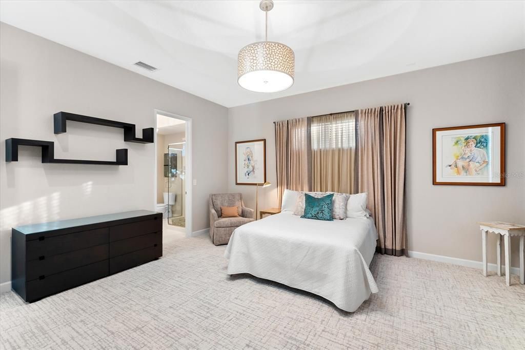 Nestled along the serene shores of Cocoanut Bayou, this captivating 4-bedroom, 4-bathroom sanctuary offers an unparalleled lifestyle for sailboat enthusiasts, boasting two boat lifts and panoramic water views.