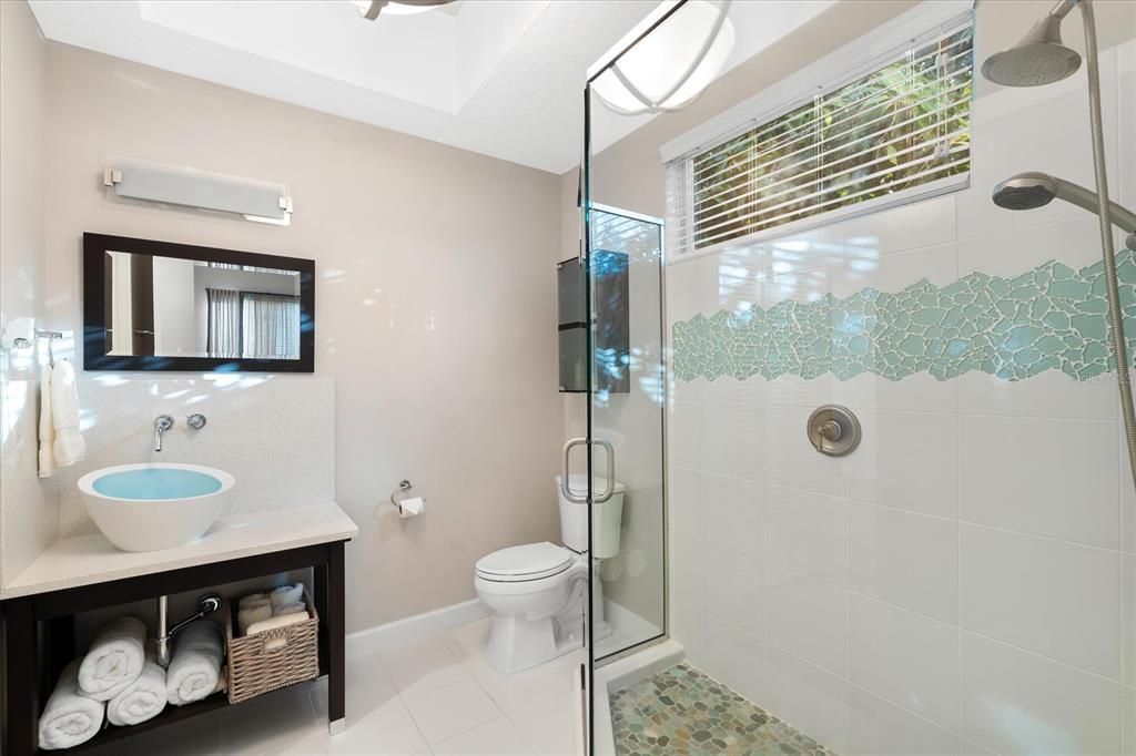 Nestled along the serene shores of Cocoanut Bayou, this captivating 4-bedroom, 4-bathroom sanctuary offers an unparalleled lifestyle for sailboat enthusiasts, boasting two boat lifts and panoramic water views.
