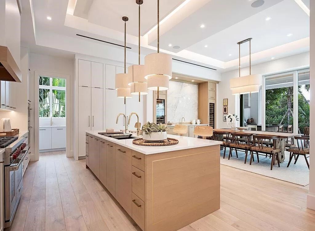 Welcome to 480 Spinnaker Dr, Naples, Florida – a newly constructed masterpiece designed by Falconer Jones, offering 6 bedrooms, 7 bathrooms, and 6,497 square feet of luxurious living space just blocks away from the Gulf of Mexico.