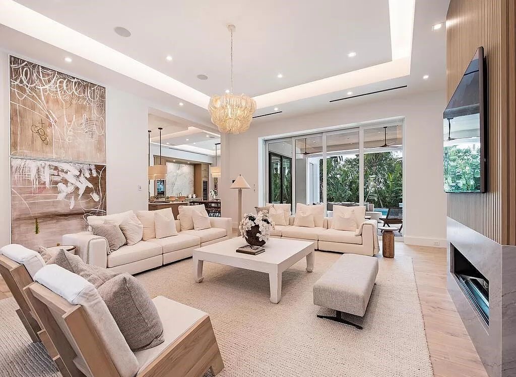 Welcome to 480 Spinnaker Dr, Naples, Florida – a newly constructed masterpiece designed by Falconer Jones, offering 6 bedrooms, 7 bathrooms, and 6,497 square feet of luxurious living space just blocks away from the Gulf of Mexico.