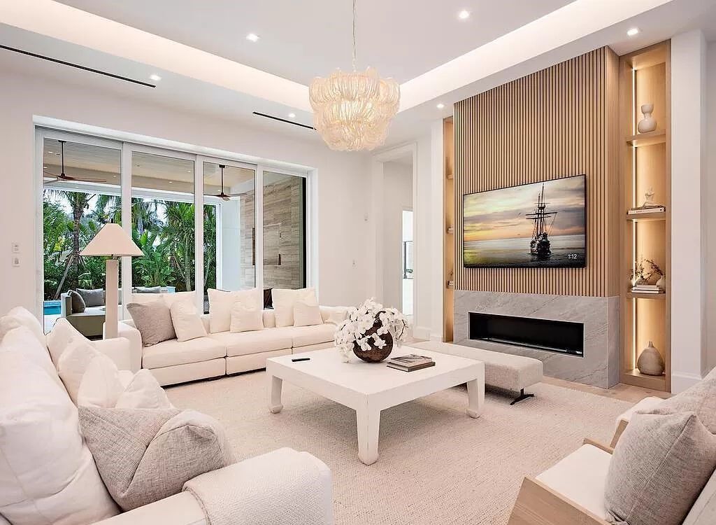 Welcome to 480 Spinnaker Dr, Naples, Florida – a newly constructed masterpiece designed by Falconer Jones, offering 6 bedrooms, 7 bathrooms, and 6,497 square feet of luxurious living space just blocks away from the Gulf of Mexico.