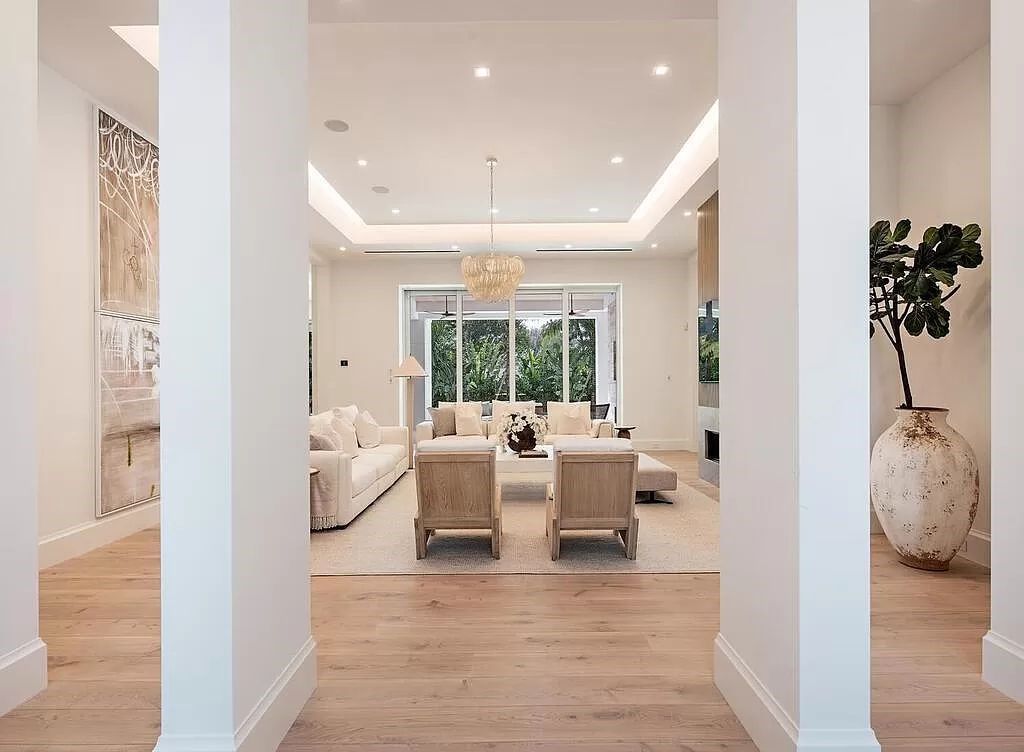 Welcome to 480 Spinnaker Dr, Naples, Florida – a newly constructed masterpiece designed by Falconer Jones, offering 6 bedrooms, 7 bathrooms, and 6,497 square feet of luxurious living space just blocks away from the Gulf of Mexico.