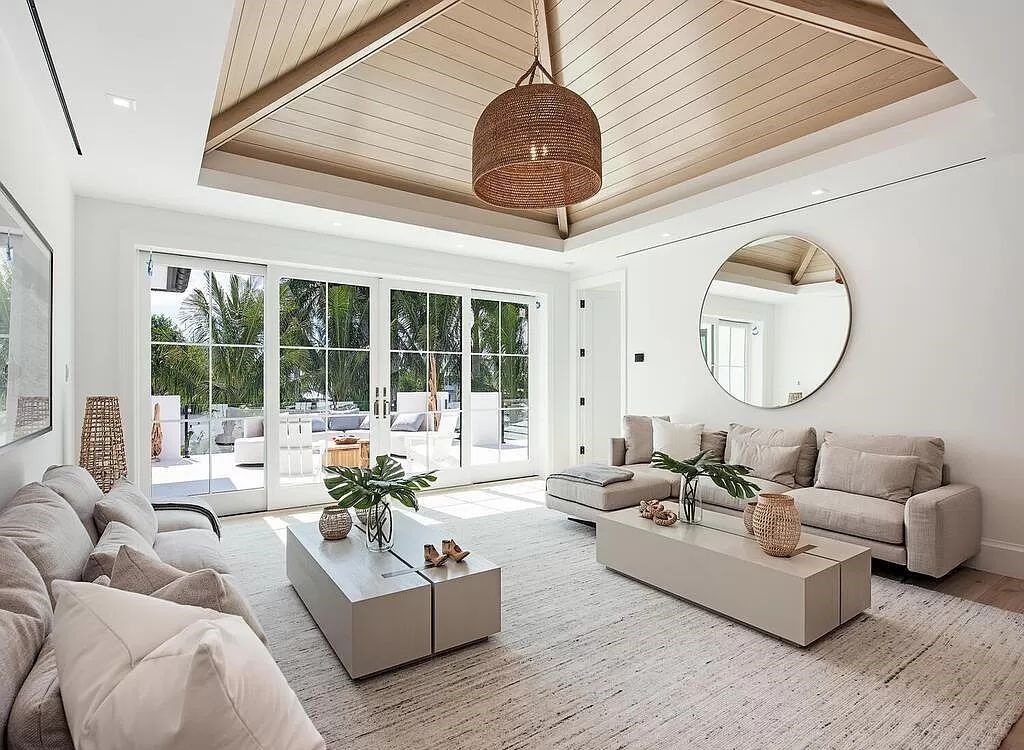 Welcome to 480 Spinnaker Dr, Naples, Florida – a newly constructed masterpiece designed by Falconer Jones, offering 6 bedrooms, 7 bathrooms, and 6,497 square feet of luxurious living space just blocks away from the Gulf of Mexico.