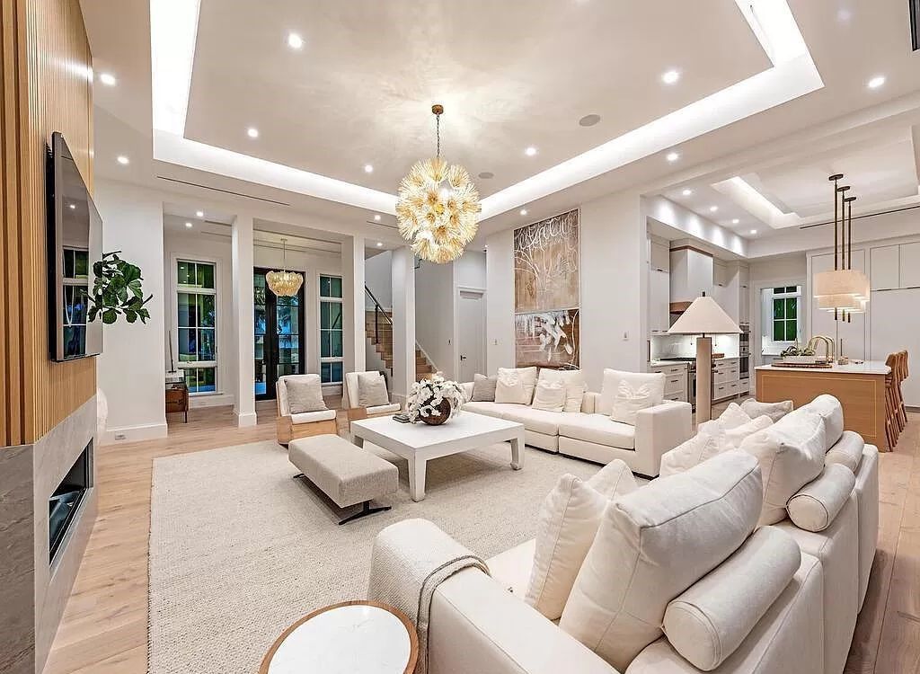 Welcome to 480 Spinnaker Dr, Naples, Florida – a newly constructed masterpiece designed by Falconer Jones, offering 6 bedrooms, 7 bathrooms, and 6,497 square feet of luxurious living space just blocks away from the Gulf of Mexico.