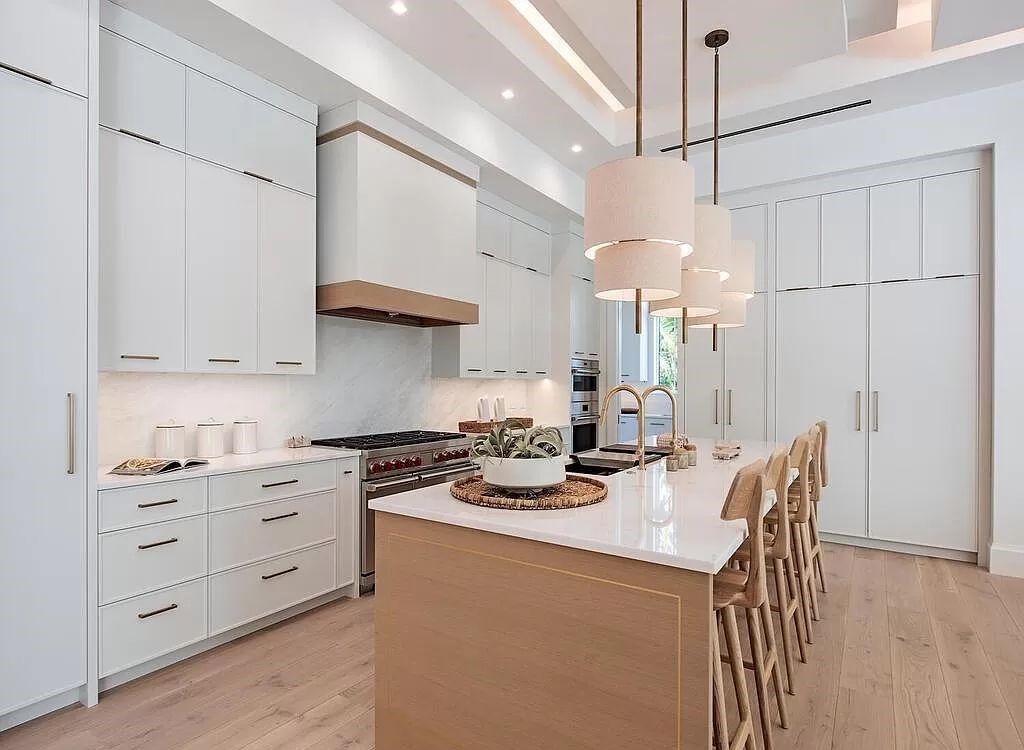 Welcome to 480 Spinnaker Dr, Naples, Florida – a newly constructed masterpiece designed by Falconer Jones, offering 6 bedrooms, 7 bathrooms, and 6,497 square feet of luxurious living space just blocks away from the Gulf of Mexico.