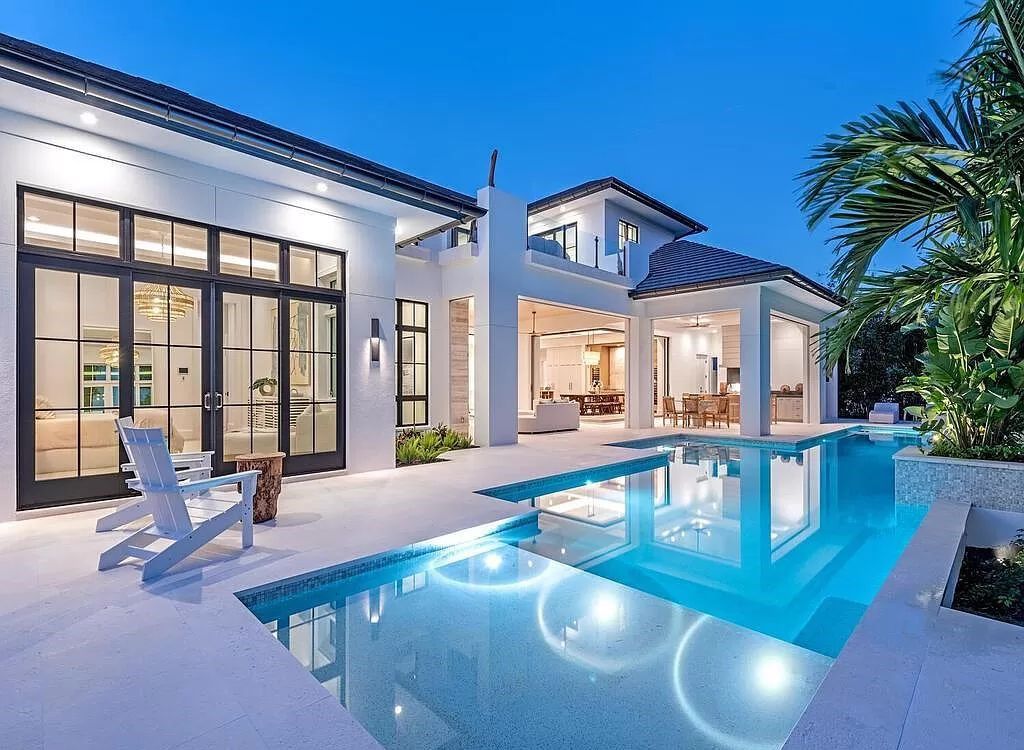 Welcome to 480 Spinnaker Dr, Naples, Florida – a newly constructed masterpiece designed by Falconer Jones, offering 6 bedrooms, 7 bathrooms, and 6,497 square feet of luxurious living space just blocks away from the Gulf of Mexico.