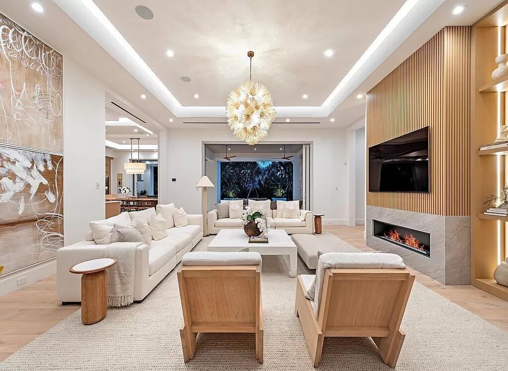 Welcome to 480 Spinnaker Dr, Naples, Florida – a newly constructed masterpiece designed by Falconer Jones, offering 6 bedrooms, 7 bathrooms, and 6,497 square feet of luxurious living space just blocks away from the Gulf of Mexico.