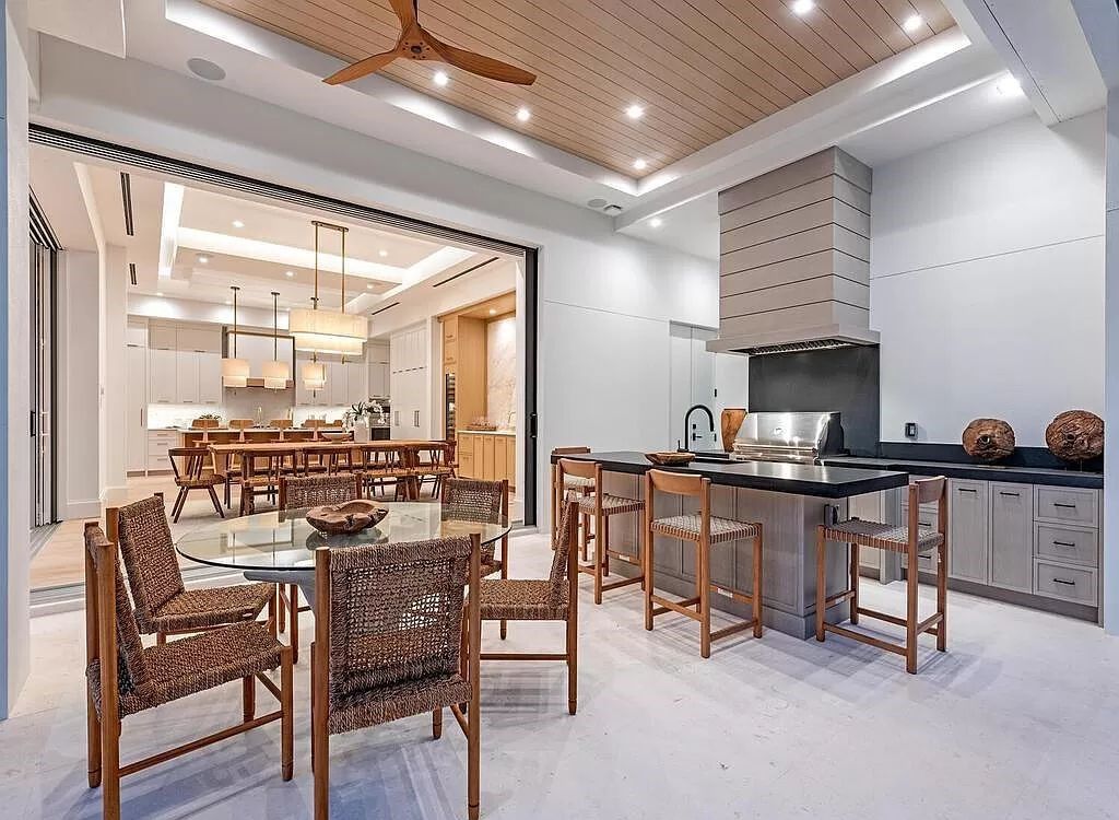 Welcome to 480 Spinnaker Dr, Naples, Florida – a newly constructed masterpiece designed by Falconer Jones, offering 6 bedrooms, 7 bathrooms, and 6,497 square feet of luxurious living space just blocks away from the Gulf of Mexico.