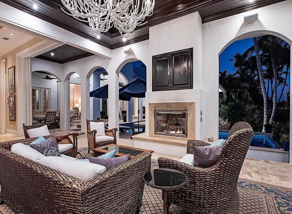 Welcome to 1750 4th St S, Naples, FL 34102, where coastal luxury meets unbeatable convenience just 4 blocks from the beach and 3rd St.