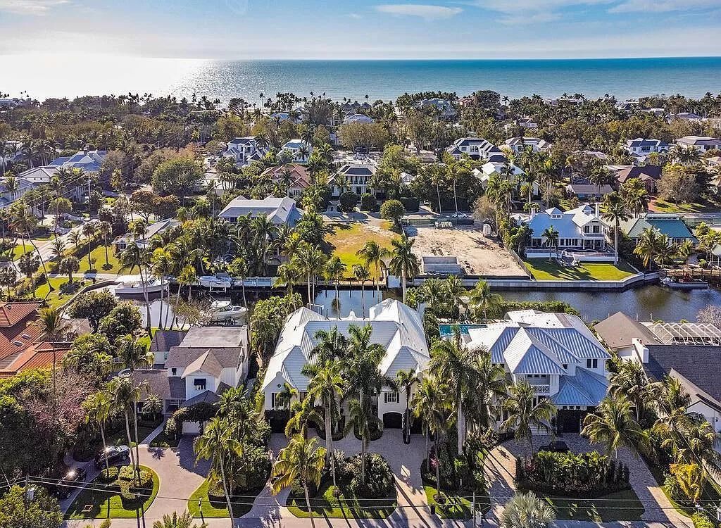 Welcome to 1750 4th St S, Naples, FL 34102, where coastal luxury meets unbeatable convenience just 4 blocks from the beach and 3rd St.