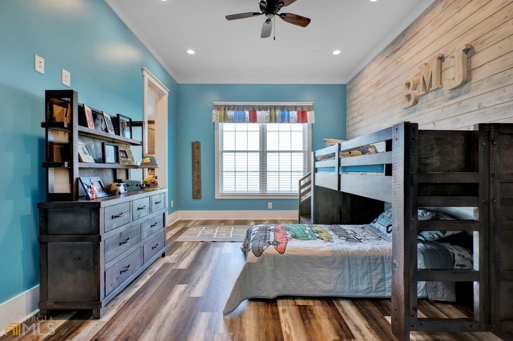 1211 Owens Gin Road NE Home in Calhoun, Georgia. Explore the beauty of this 39.55-acre farm nestled in Northwest Georgia, featuring a stunning home overlooking a stocked lake and the Coosawattee River.