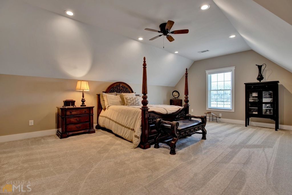 1211 Owens Gin Road NE Home in Calhoun, Georgia. Explore the beauty of this 39.55-acre farm nestled in Northwest Georgia, featuring a stunning home overlooking a stocked lake and the Coosawattee River.