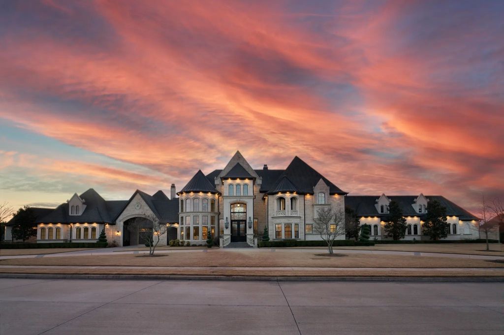 1252 Wales Drive Home in Rockwall, Texas. Step into luxury living at its finest with this illustrious estate set on over two private acres. Enjoy resort-style amenities including a pool with swim-up bar, fire features, waterfalls, and a covered patio with motorized screens.