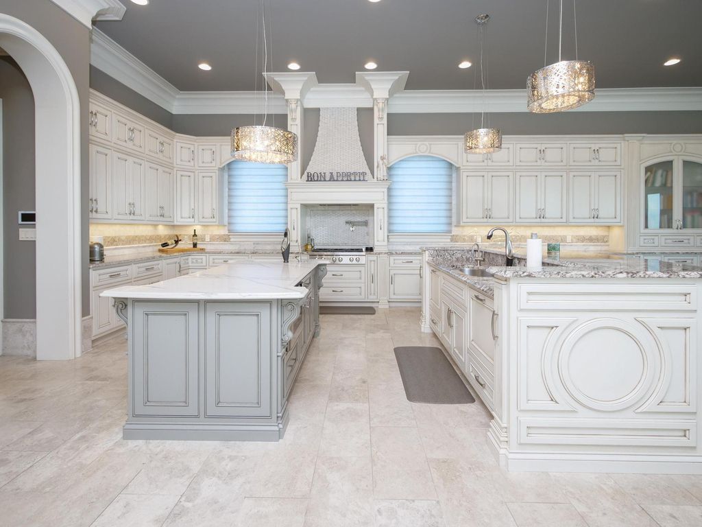 12768 Highwick Circle Home in Knoxville, Tennessee. Explore the epitome of luxury living at this architectural masterpiece nestled in prestigious Bridgemore. Perched atop Farragut's highest point, this one-of-a-kind home offers breathtaking views of the mountains and lake. 