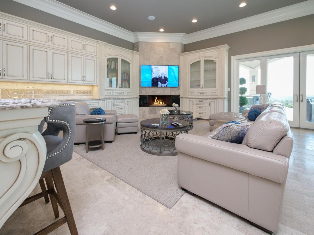 12768 Highwick Circle Home in Knoxville, Tennessee. Explore the epitome of luxury living at this architectural masterpiece nestled in prestigious Bridgemore. Perched atop Farragut's highest point, this one-of-a-kind home offers breathtaking views of the mountains and lake. 
