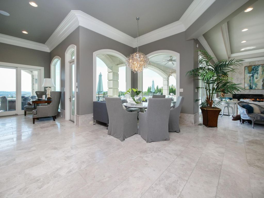 12768 Highwick Circle Home in Knoxville, Tennessee. Explore the epitome of luxury living at this architectural masterpiece nestled in prestigious Bridgemore. Perched atop Farragut's highest point, this one-of-a-kind home offers breathtaking views of the mountains and lake. 