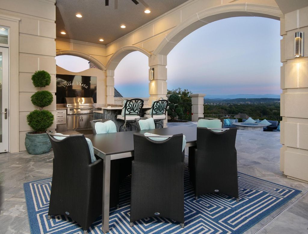 12768 Highwick Circle Home in Knoxville, Tennessee. Explore the epitome of luxury living at this architectural masterpiece nestled in prestigious Bridgemore. Perched atop Farragut's highest point, this one-of-a-kind home offers breathtaking views of the mountains and lake. 