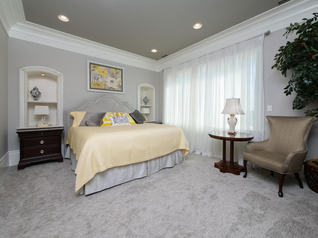 12768 Highwick Circle Home in Knoxville, Tennessee. Explore the epitome of luxury living at this architectural masterpiece nestled in prestigious Bridgemore. Perched atop Farragut's highest point, this one-of-a-kind home offers breathtaking views of the mountains and lake. 
