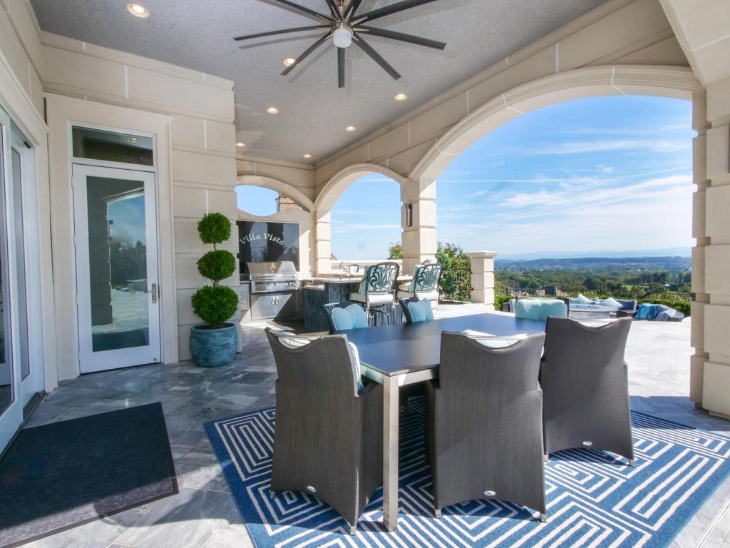 12768 Highwick Circle Home in Knoxville, Tennessee. Explore the epitome of luxury living at this architectural masterpiece nestled in prestigious Bridgemore. Perched atop Farragut's highest point, this one-of-a-kind home offers breathtaking views of the mountains and lake. 