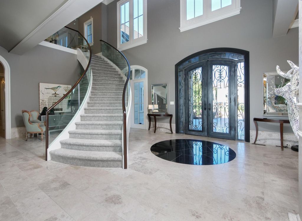 12768 Highwick Circle Home in Knoxville, Tennessee. Explore the epitome of luxury living at this architectural masterpiece nestled in prestigious Bridgemore. Perched atop Farragut's highest point, this one-of-a-kind home offers breathtaking views of the mountains and lake. 